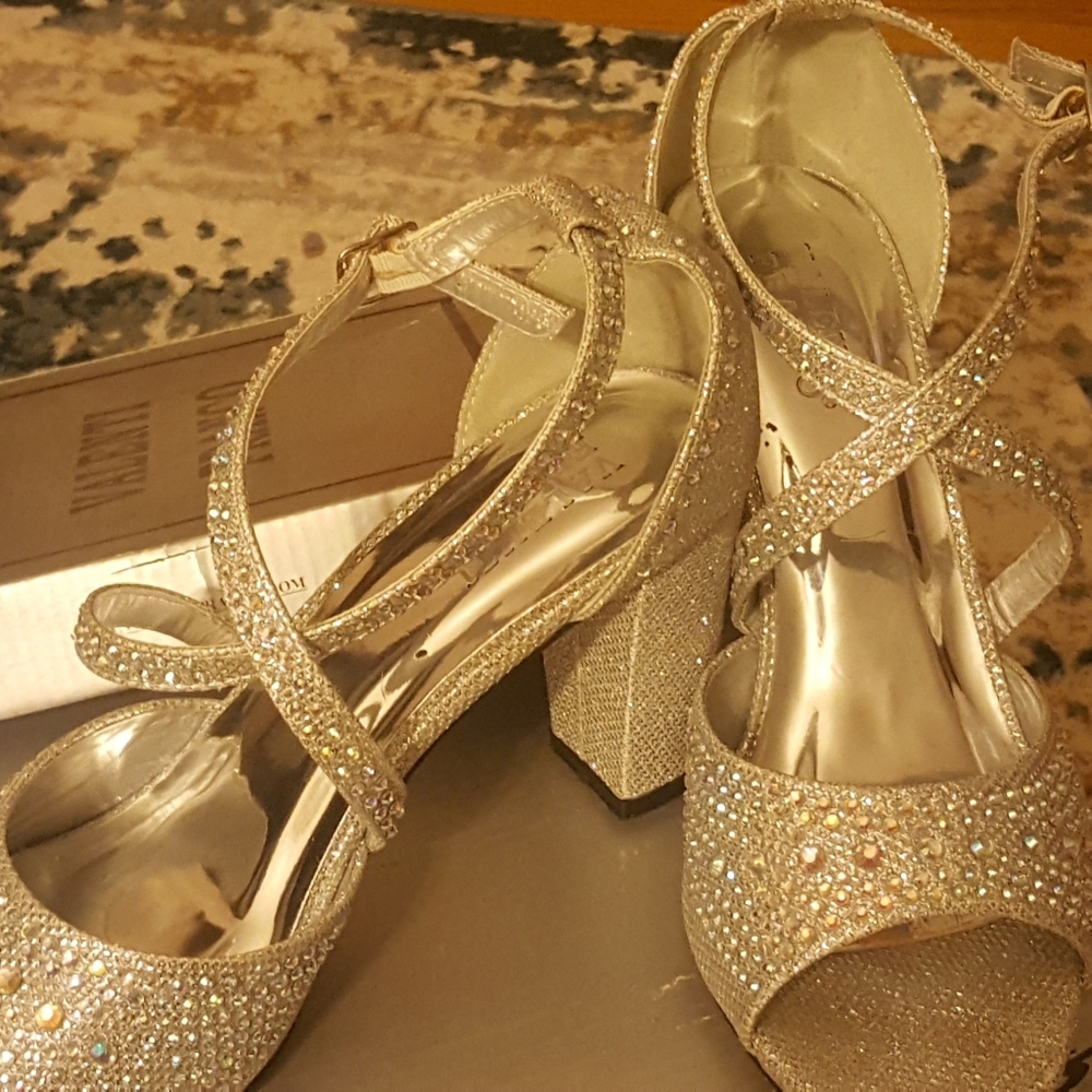 Silver high heel with beautiful rhinestone detail